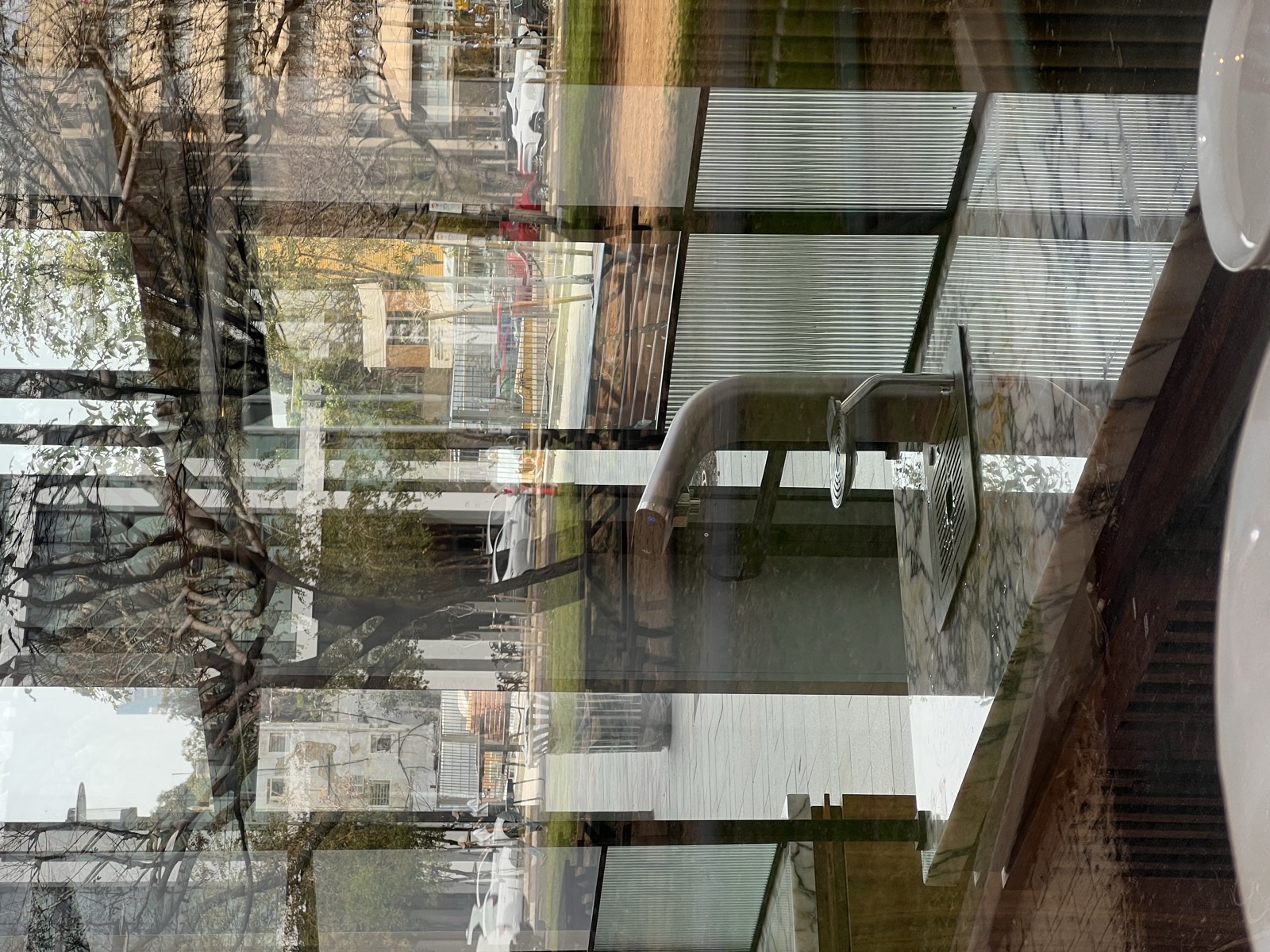 VISIO chrome faucet installed in a modern office